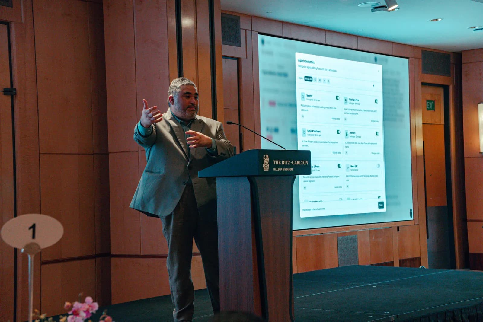 Dexter Ligot-Gordon presenting agent connectors at NRF Singapore